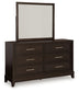 Neymorton Queen Upholstered Panel Bed with Mirrored Dresser and Chest