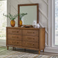 Lyncott Queen Upholstered Bed with Mirrored Dresser